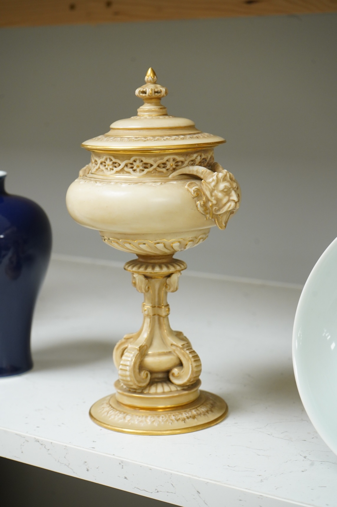 A late Victorian Royal Worcester porcelain pot pourri and cover, numbered 139 to base, 25cm